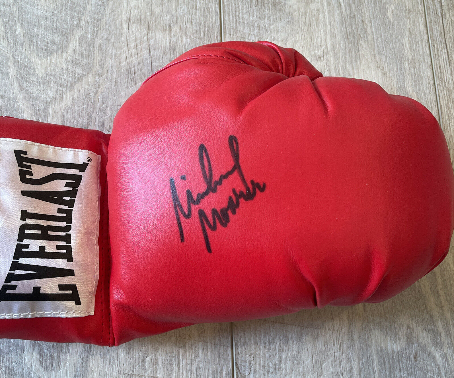 Michael Moorer - Autographed Everlast Boxing Glove - Authentic